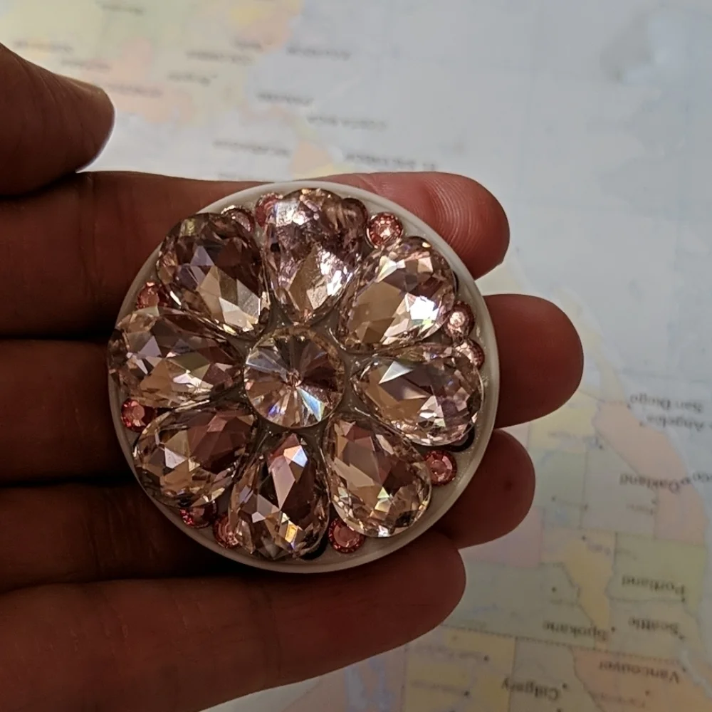 Pink bejeweled phone holder